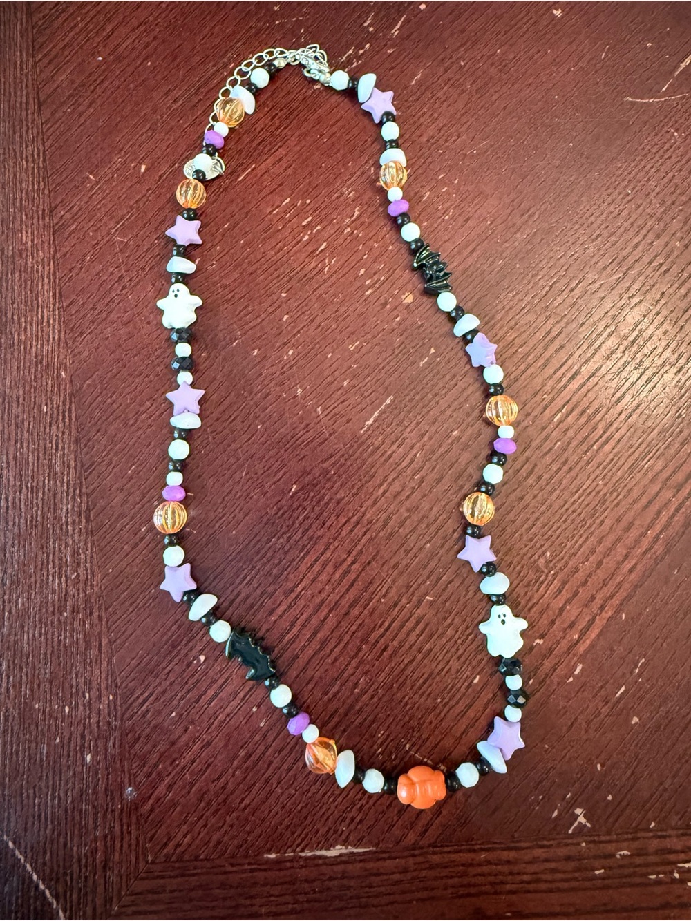 Claire’s adorable Halloween Beaded Necklace with Purple Stars and Orange Accents